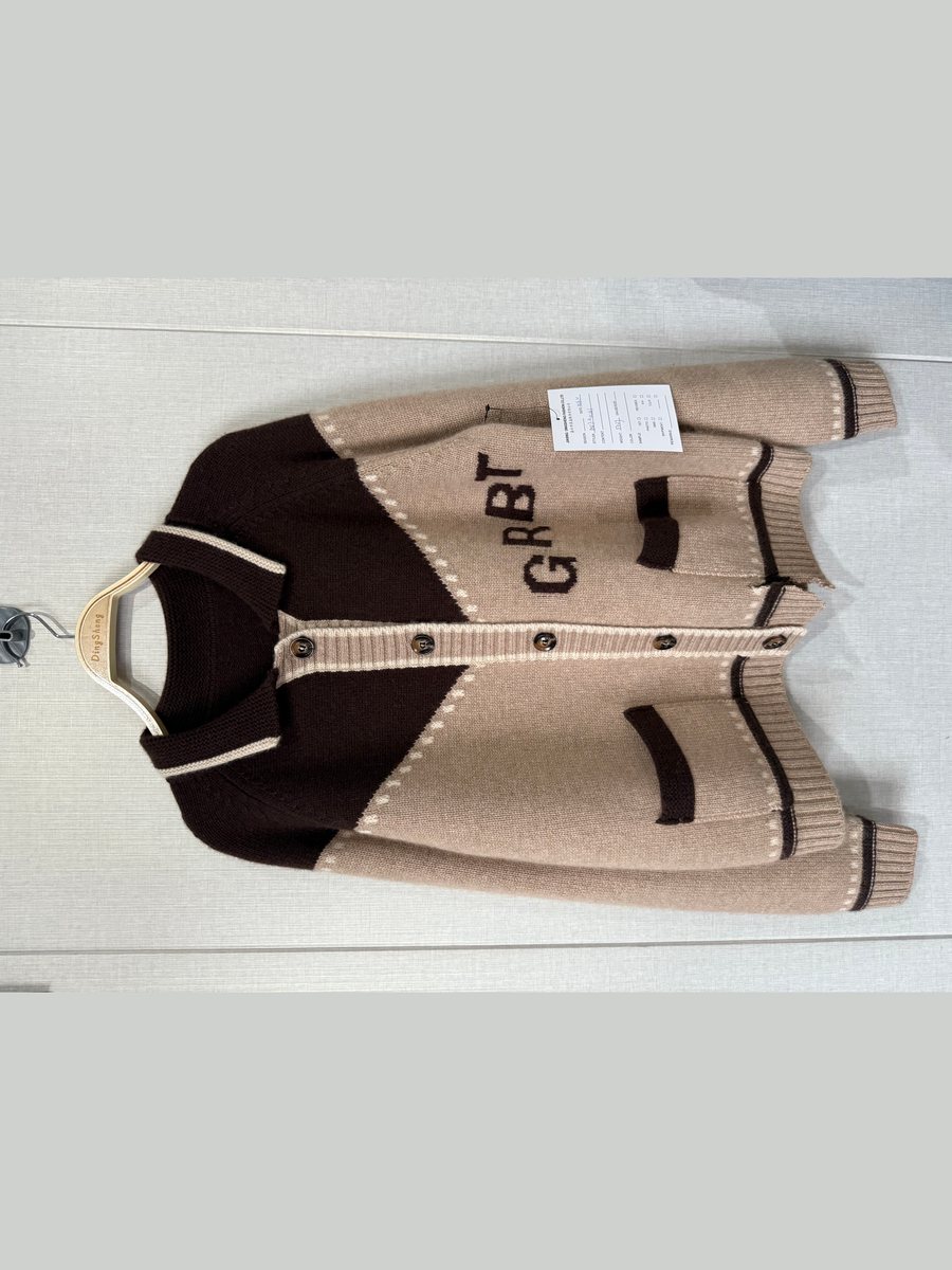 Beige and brown cashmere cardigan with knitted lettering, style DS27-K10261, from the Knitwear World sample collection