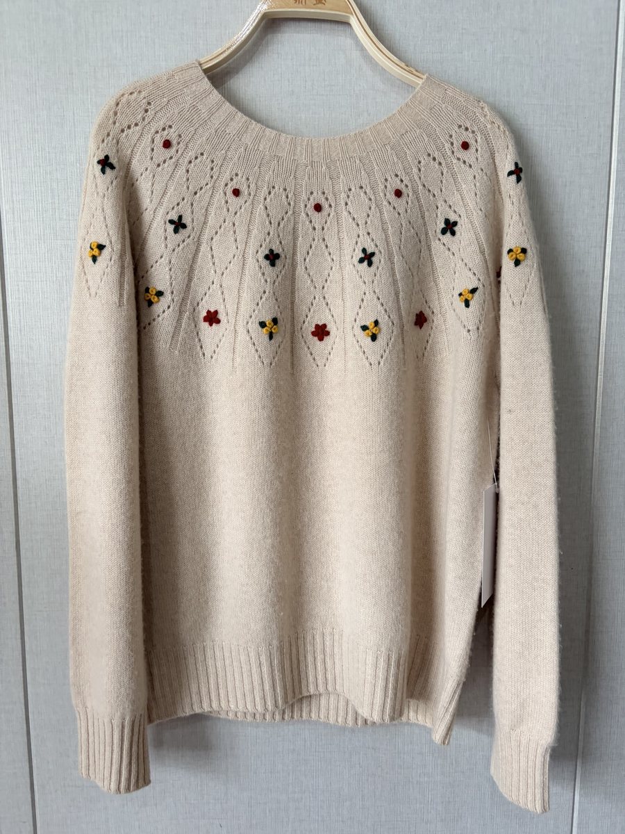 Beige pointelle yoke pullover with embroidery, style DS26-PX-E21311, from the Knitwear World sample collection