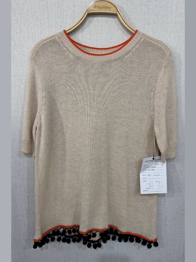 Beige short-sleeve knit top with pompom hem, style DS27-K04054, from the Knitwear World sample collection