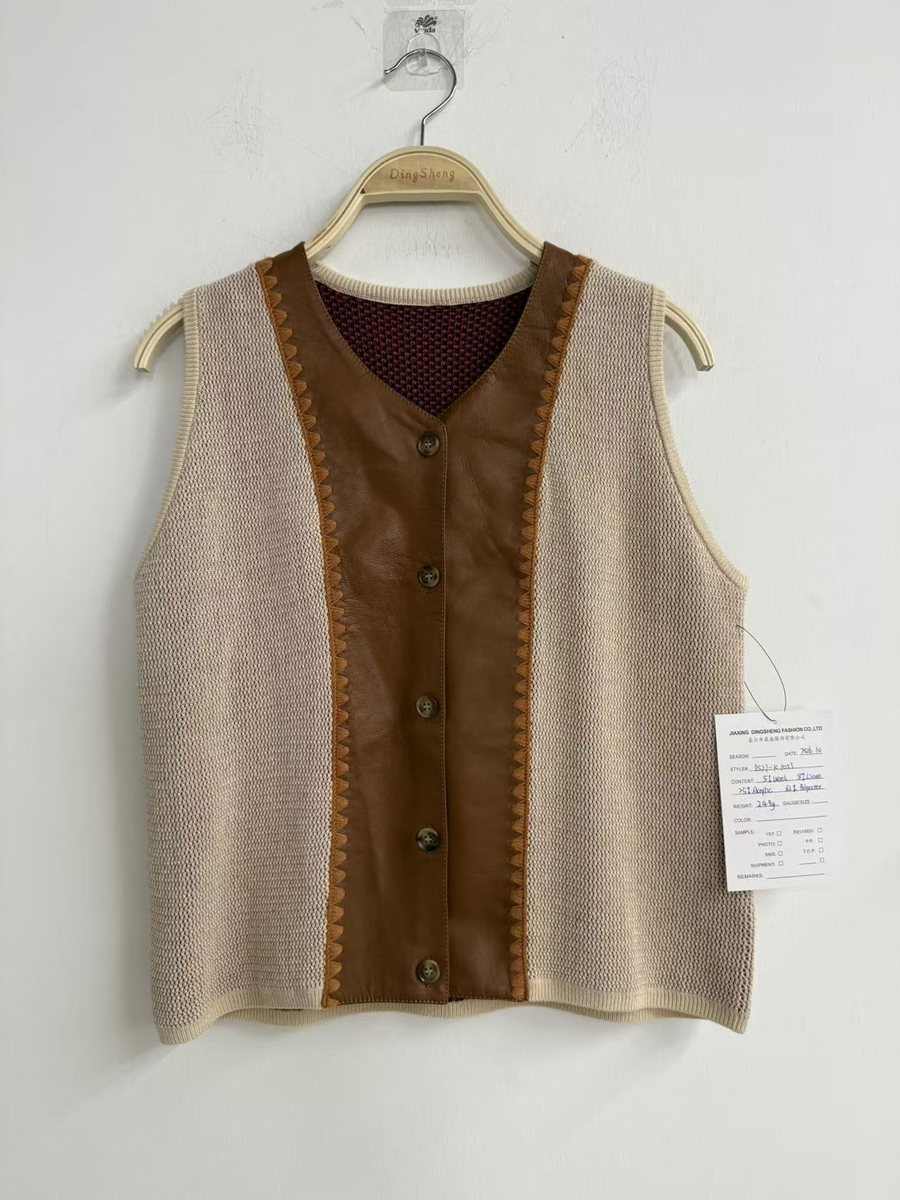 Beige sweater vest with faux-leather button placket, style DS27-K1055, from the Knitwear World sample collection