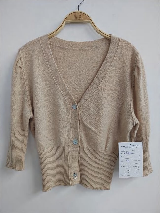 Beige V-neck cardigan with puff sleeves, style DS26-08010, from the Knitwear World sample collection
