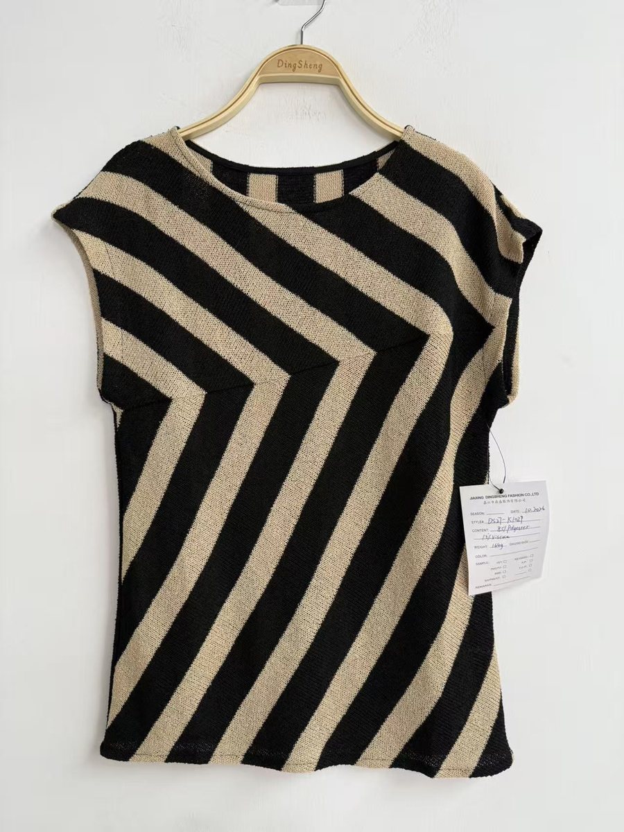 Black and beige diagonal-stripe sleeveless knit top, style DS27-K1029, from the Knitwear World sample collection
