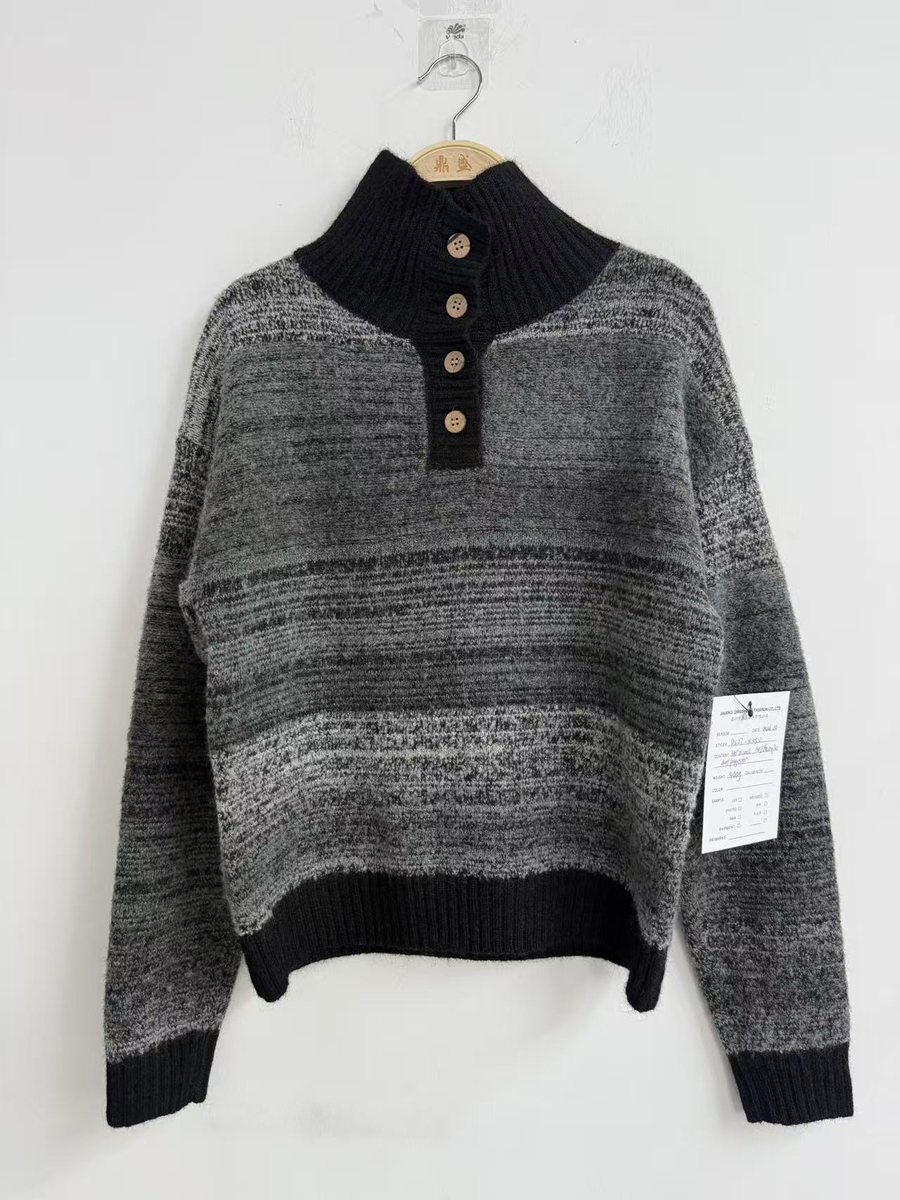 Black and grey space-dye half-button pullover, style DS27-K1050, from the Knitwear World sample collection