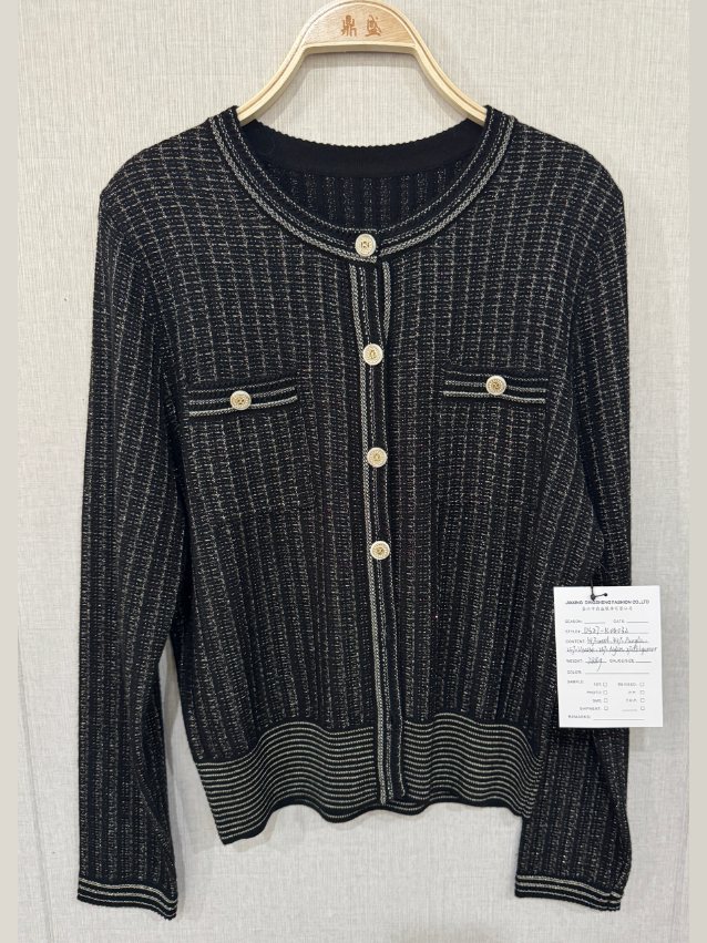 Black and ivory tweed-look cardigan jacket with pockets, style DS27-K04032, from the Knitwear World sample collection