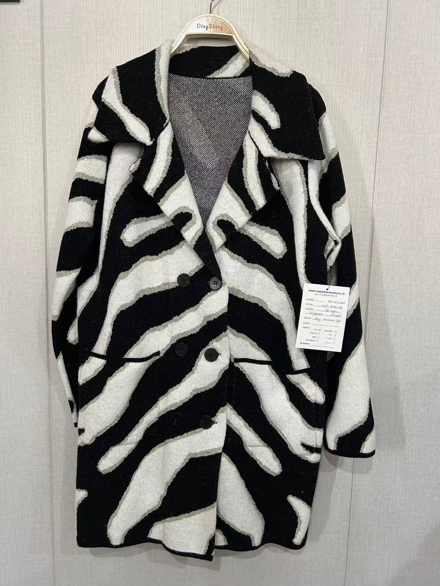 Black and white zebra faux-mink cardigan coat, style DS26-05224-AY, from the Knitwear World sample collection