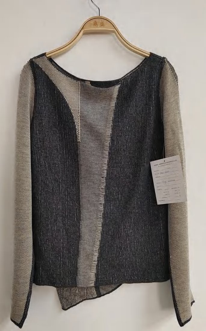 Black, grey and beige colour-block pullover, style DS26-08042, from the Knitwear World sample collection