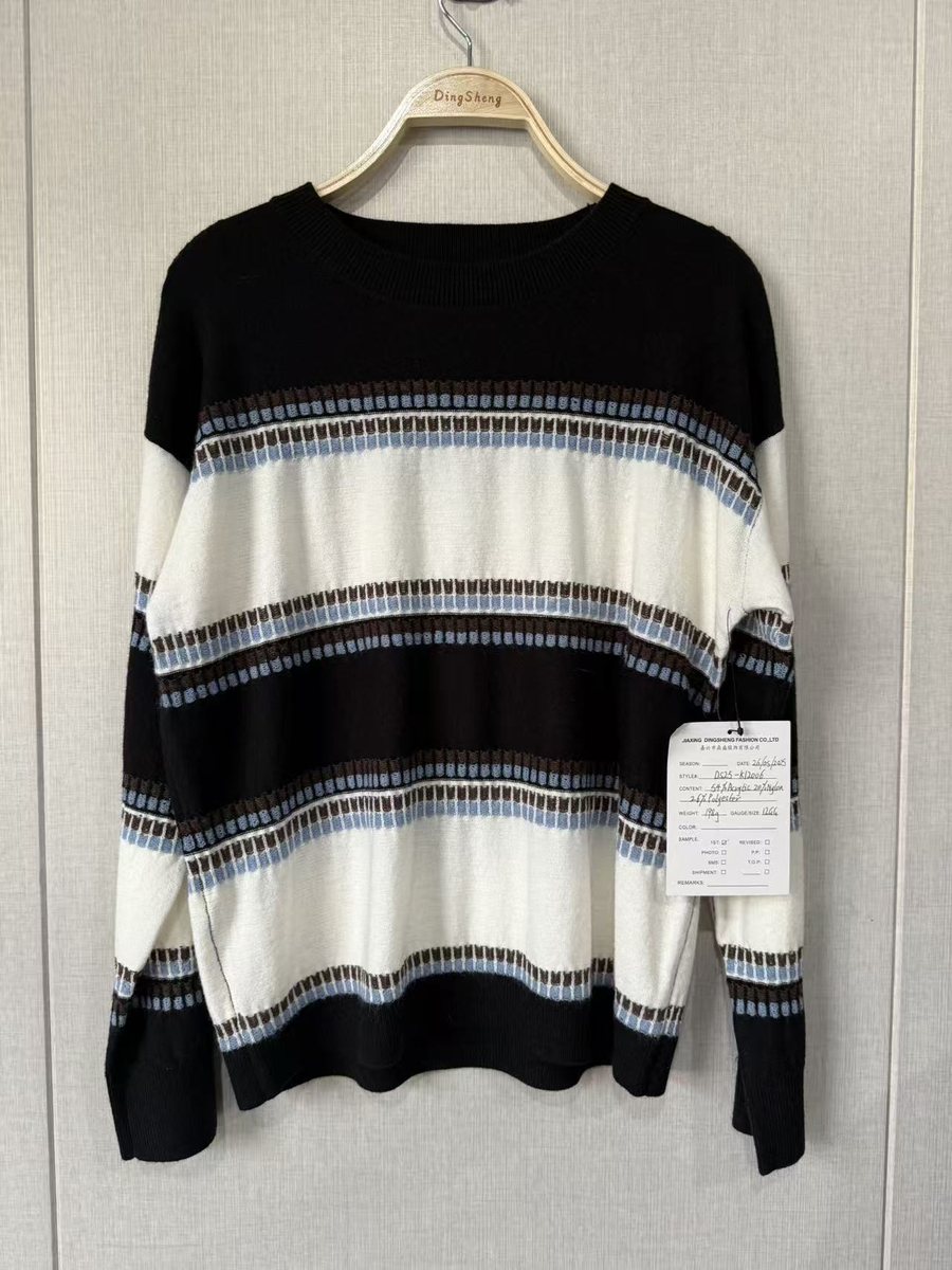 Black, ivory and blue stripe jacquard pullover, style DS25-K12006, from the Knitwear World sample collection