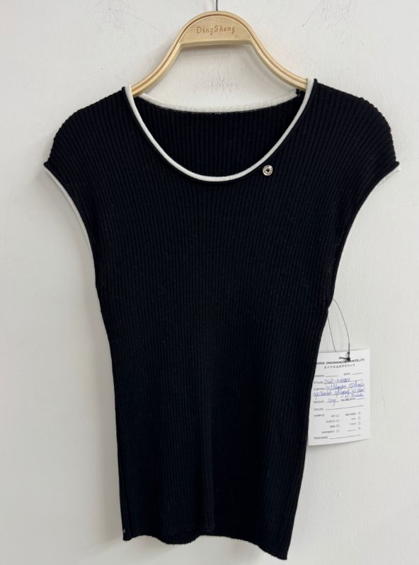 Black rib knit top with cream trim, style DS27-K06042, from the Knitwear World sample collection