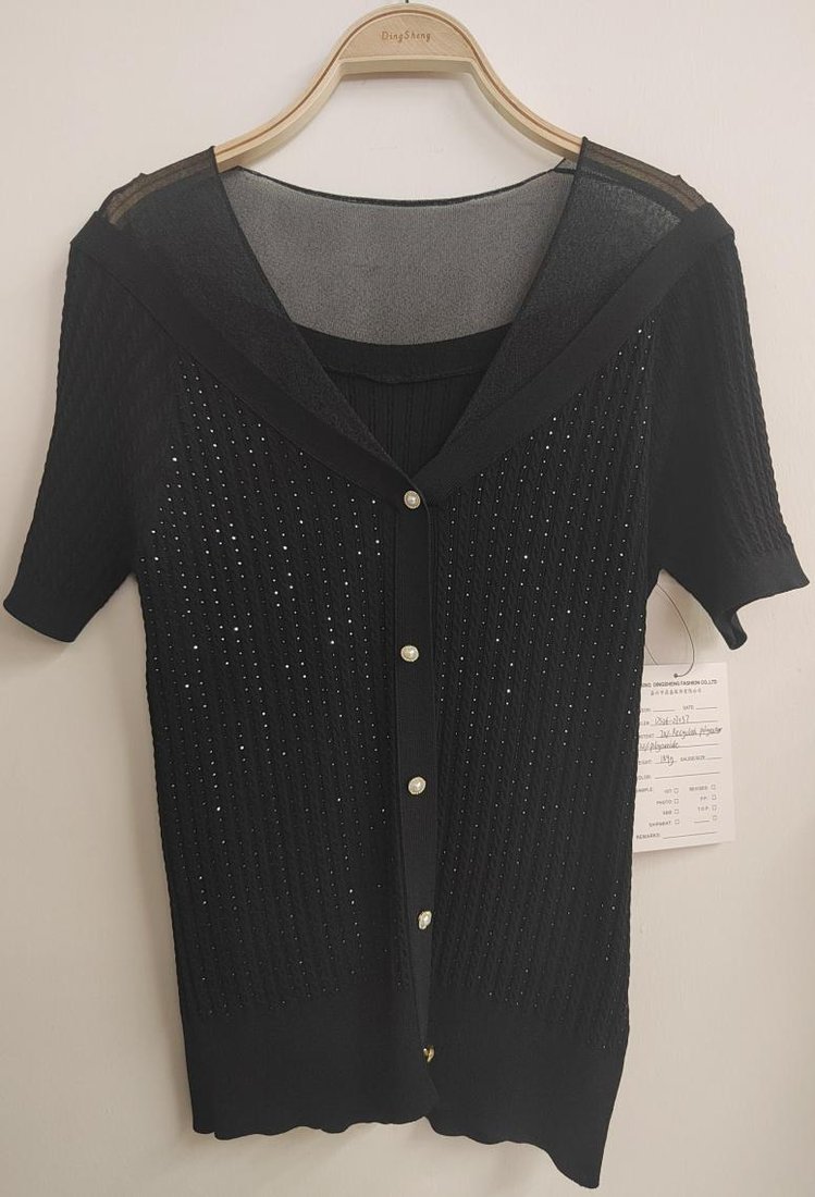 Black sheer layered short-sleeve cardigan, style DS26-07037, from the Knitwear World sample collection
