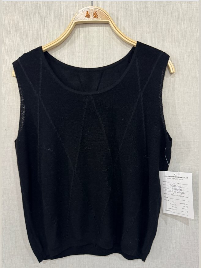 Black sleeveless knit top with seam detail, style DS27-YS7668, from the Knitwear World sample collection