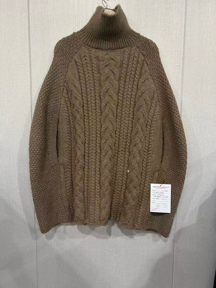 Brown cable-knit turtleneck pullover, style DS27-K10309, from the Knitwear World sample collection