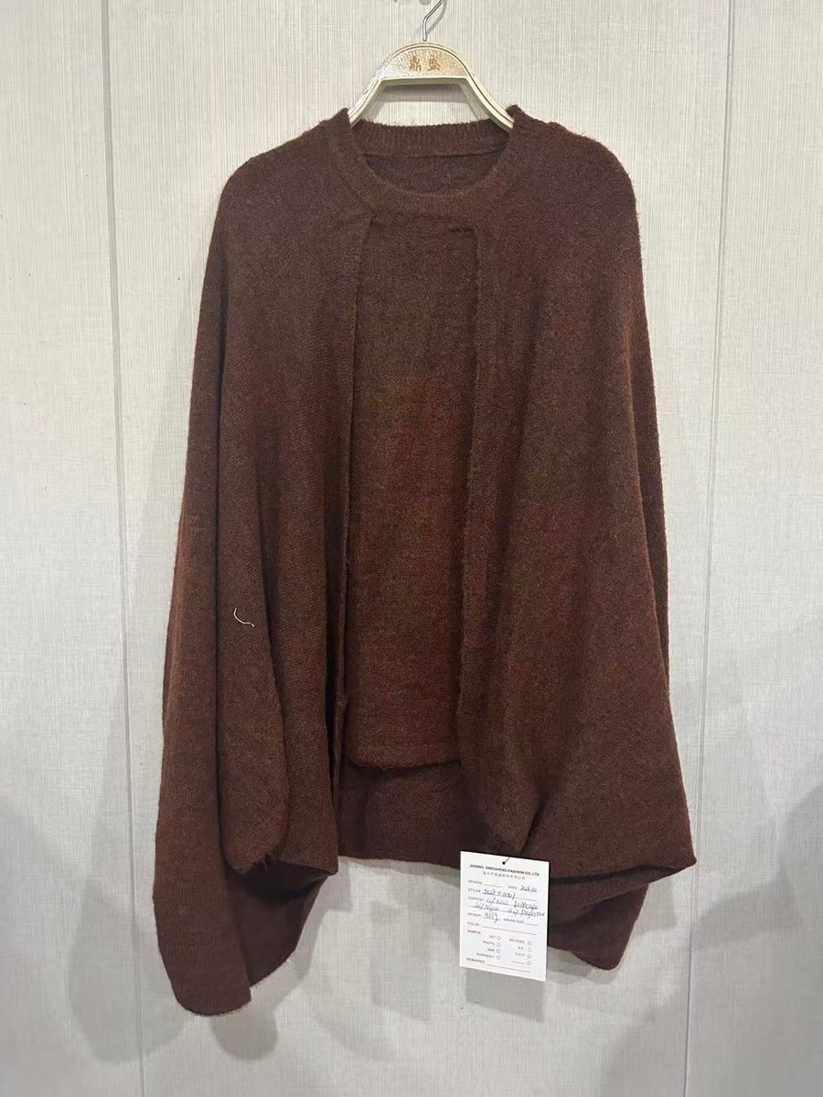Brown cardigan with attached cape layer, style DS27-K10307, from the Knitwear World sample collection