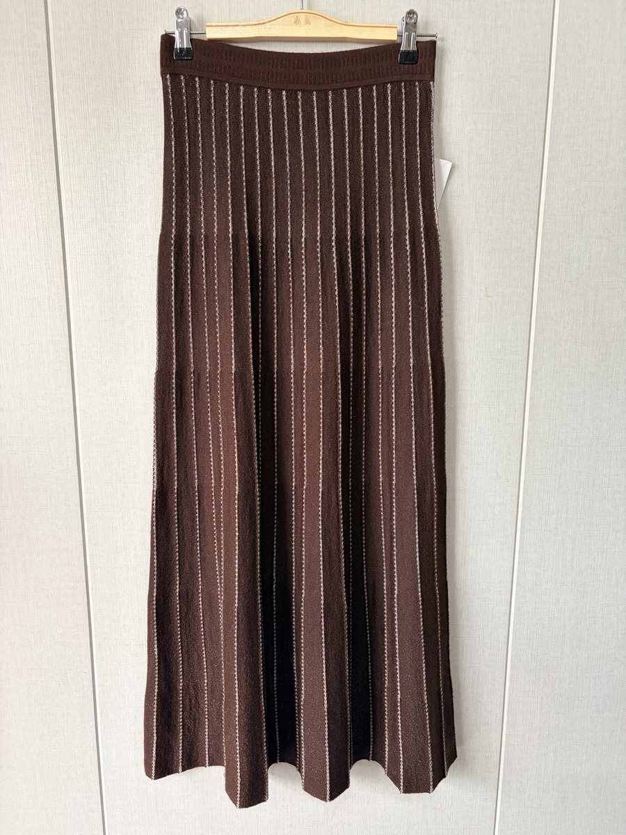 Brown pleated knit midi skirt, style DS27-K04030, from the Knitwear World sample collection