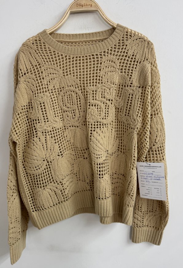 Camel open-knit pullover with number motif, style DS27-K06048, from the Knitwear World sample collection