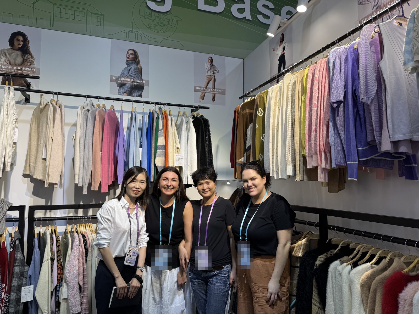 Marcia Lee and a colleague with two buyers at the Canton Fair, Guangzhou