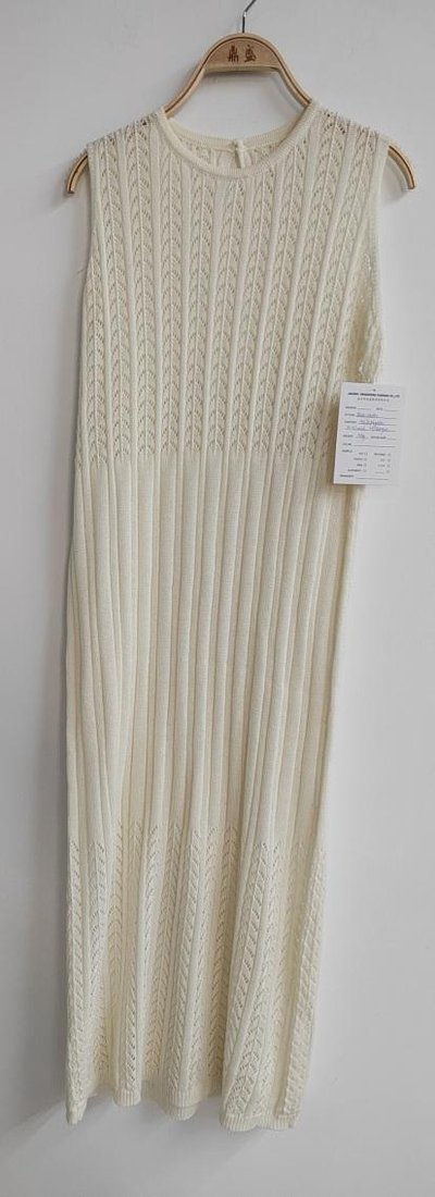 Cream cable sleeveless knit dress, style DS26-08040, from the Knitwear World sample collection