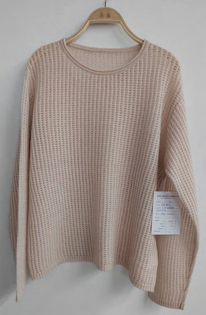 Cream open waffle-knit pullover, style DS26-08005, from the Knitwear World sample collection