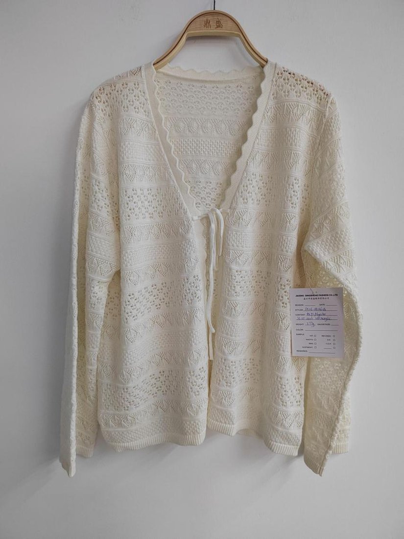 Cream pointelle cardigan, style DS26-08036-A, from the Knitwear World sample collection