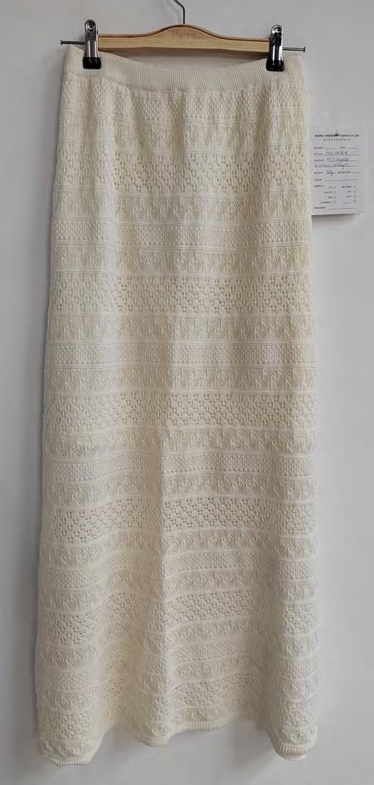 Cream pointelle midi skirt, style DS26-08036-B, from the Knitwear World sample collection