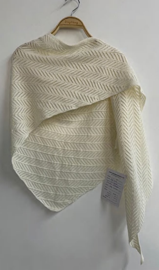 Cream textured knit shawl, style DS26-08041, from the Knitwear World sample collection