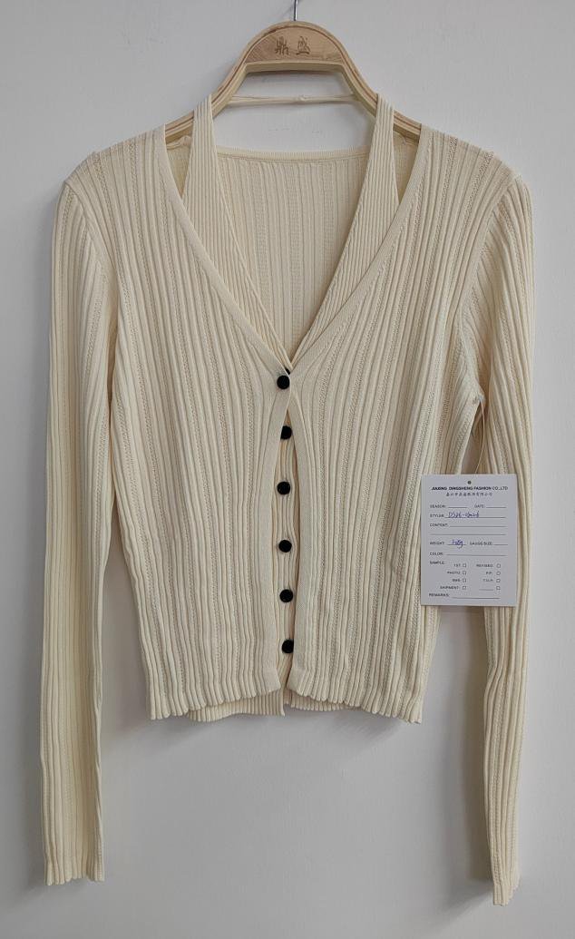 Cream V-neck rib cardigan with black buttons, style DS26-08026, from the Knitwear World sample collection