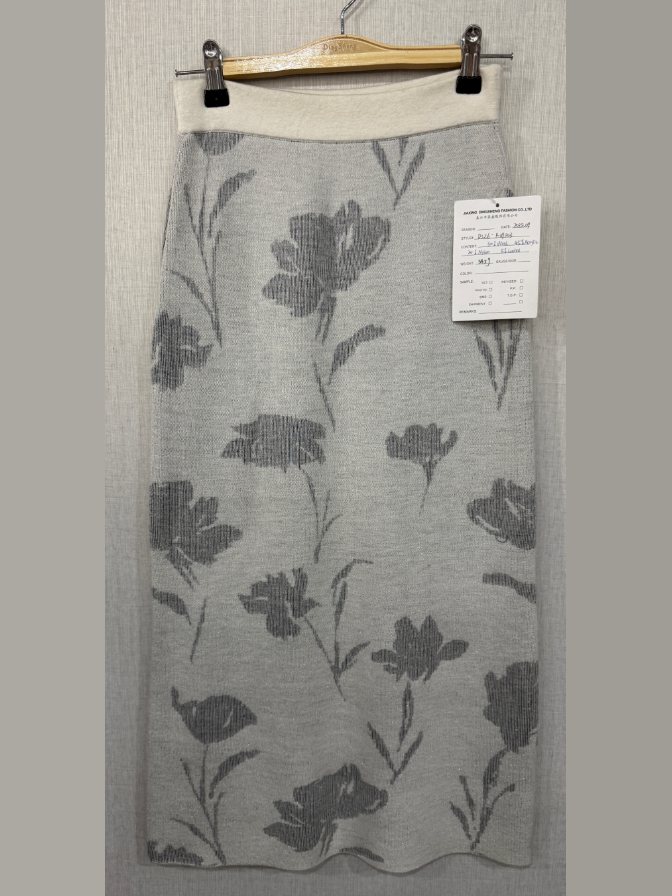 Grey and ivory floral jacquard knit midi skirt, style DS26-K09003, from the Knitwear World sample collection