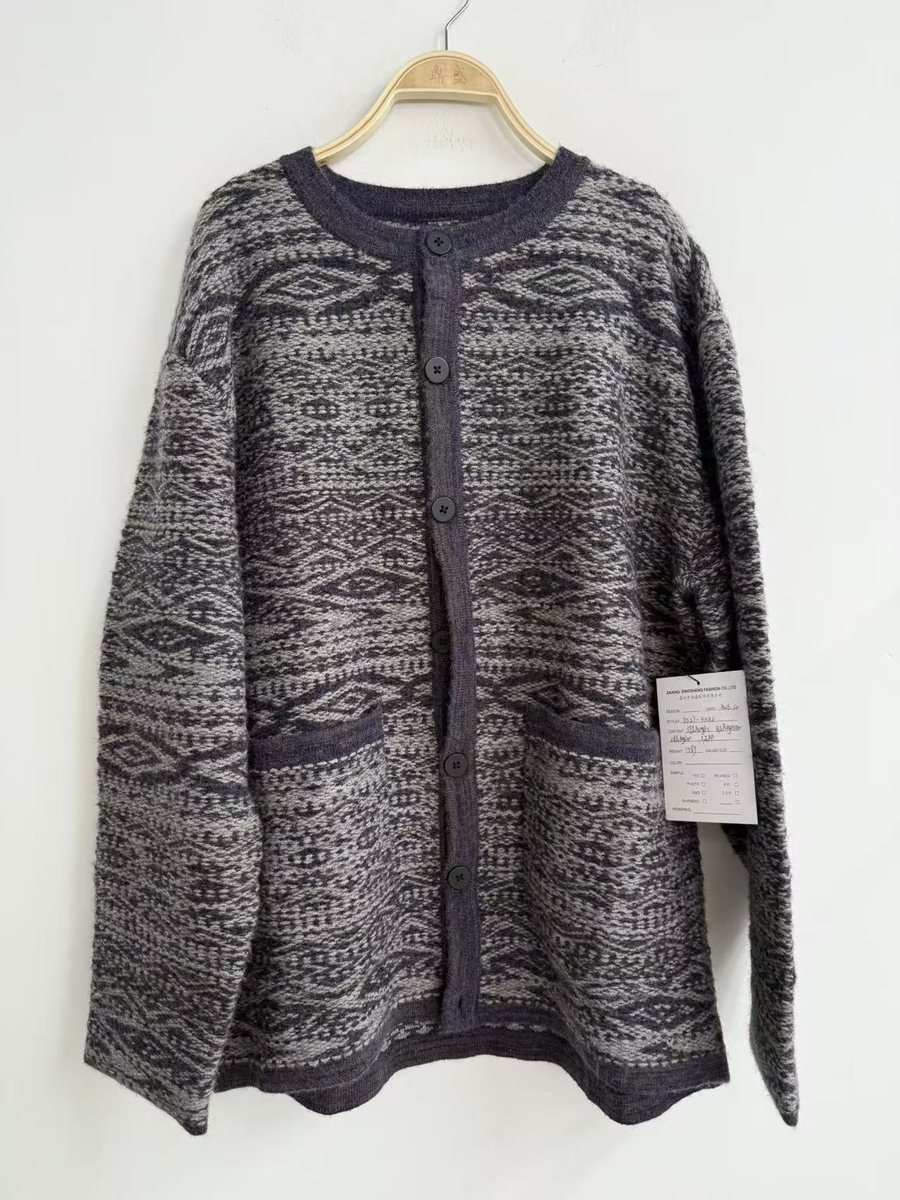 Grey and navy ikat jacquard cardigan with pockets, style DS27-K1062, from the Knitwear World sample collection