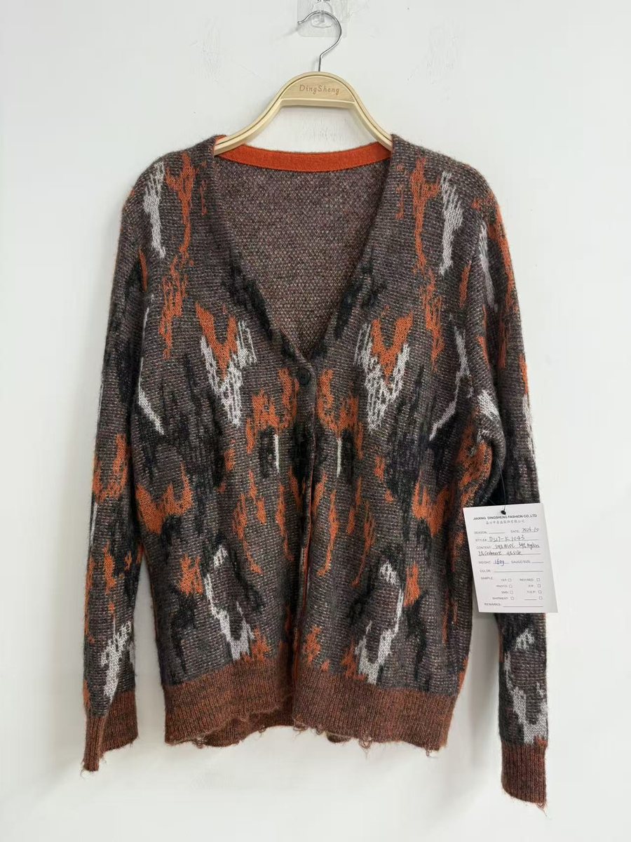 Grey and orange abstract jacquard brushed V-neck cardigan, style DS27-K1043, from the Knitwear World sample collection