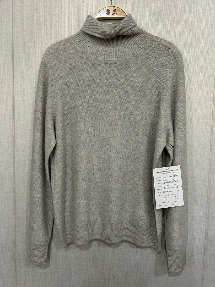 Grey lurex mock-neck pullover, style 1132, from the Knitwear World sample collection