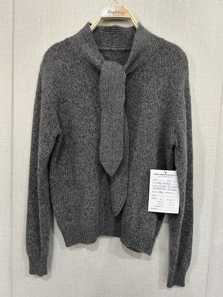 Grey marl pullover with scarf-tie neckline, style DS27-K06043A, from the Knitwear World sample collection