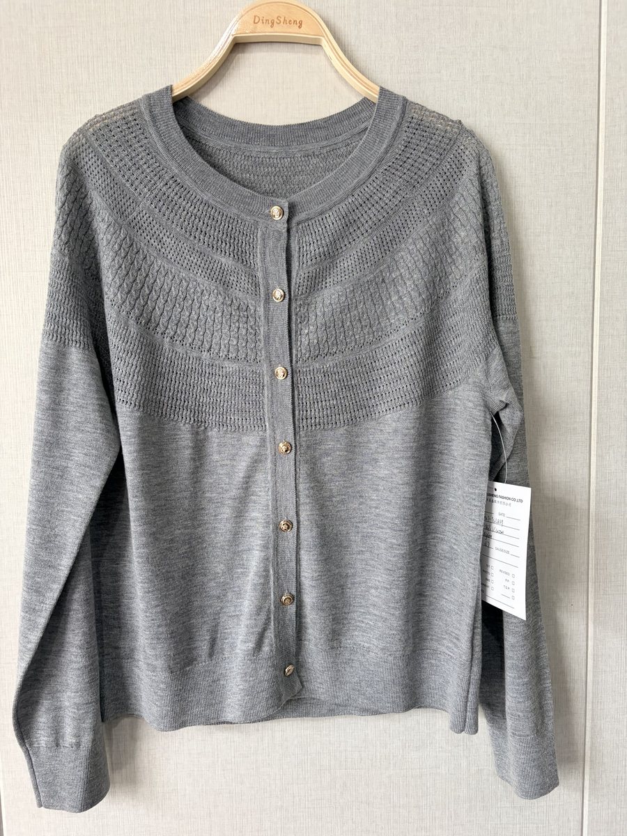 Grey pointelle-yoke cardigan, style DS27-YSL839, from the Knitwear World sample collection