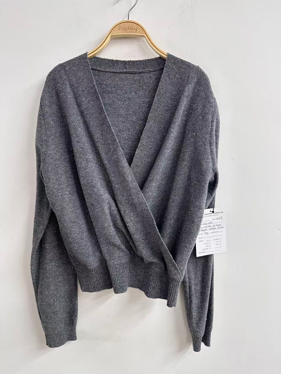 Grey wrap-front V-neck pullover, style DS26-K09013, from the Knitwear World sample collection
