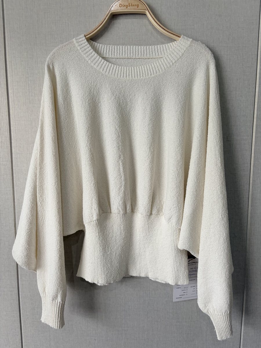 Ivory batwing pullover with rib hem, style DS27-K070028, from the Knitwear World sample collection