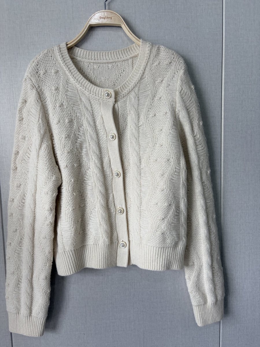 Ivory bobble-knit cardigan, style DS25-K12048, from the Knitwear World sample collection