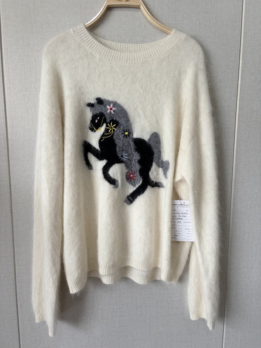 Ivory brushed pullover with horse motif, style DS27-K04067, from the Knitwear World sample collection