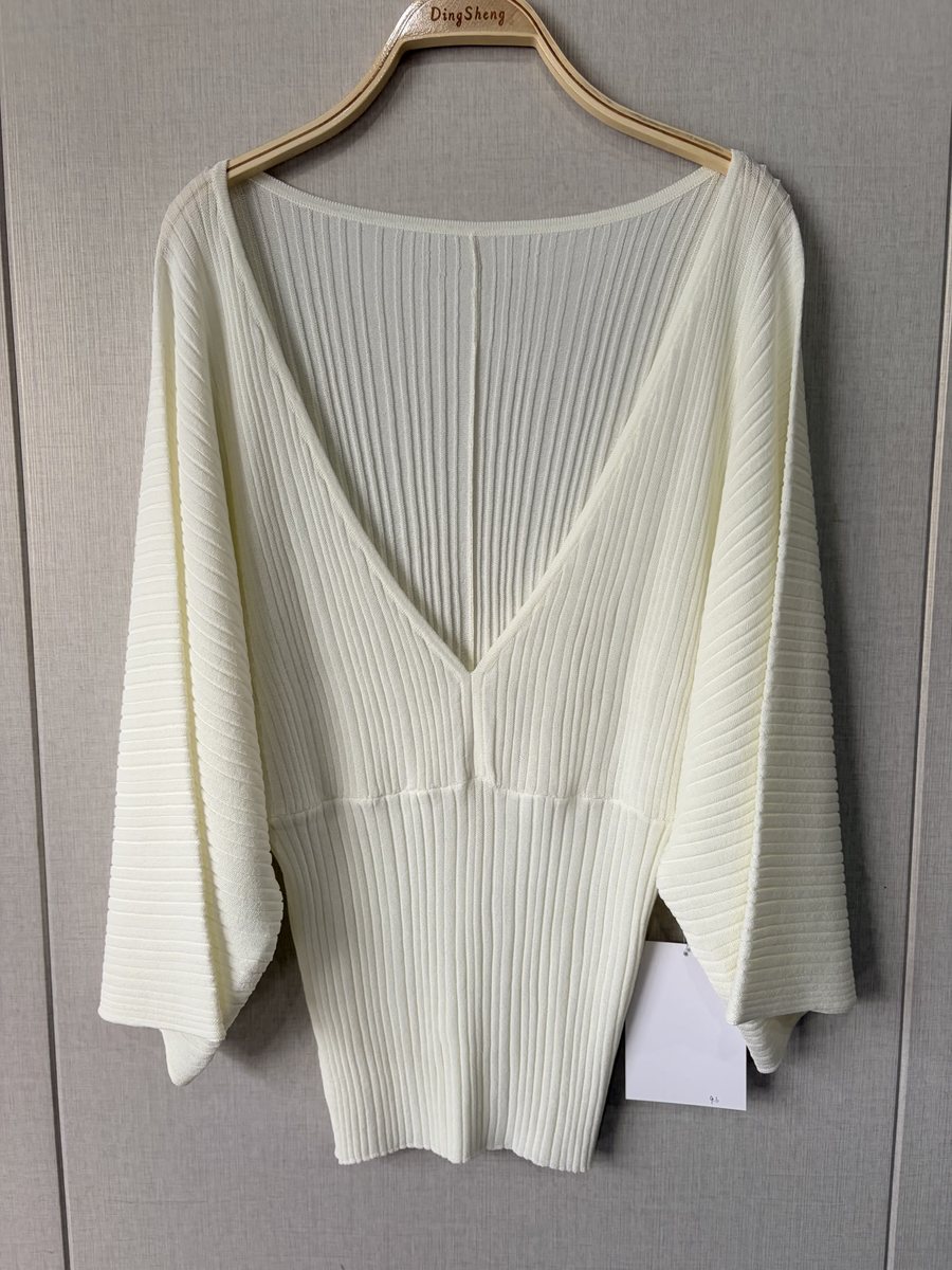 Ivory deep V-neck rib pullover, style 9446, from the Knitwear World sample collection