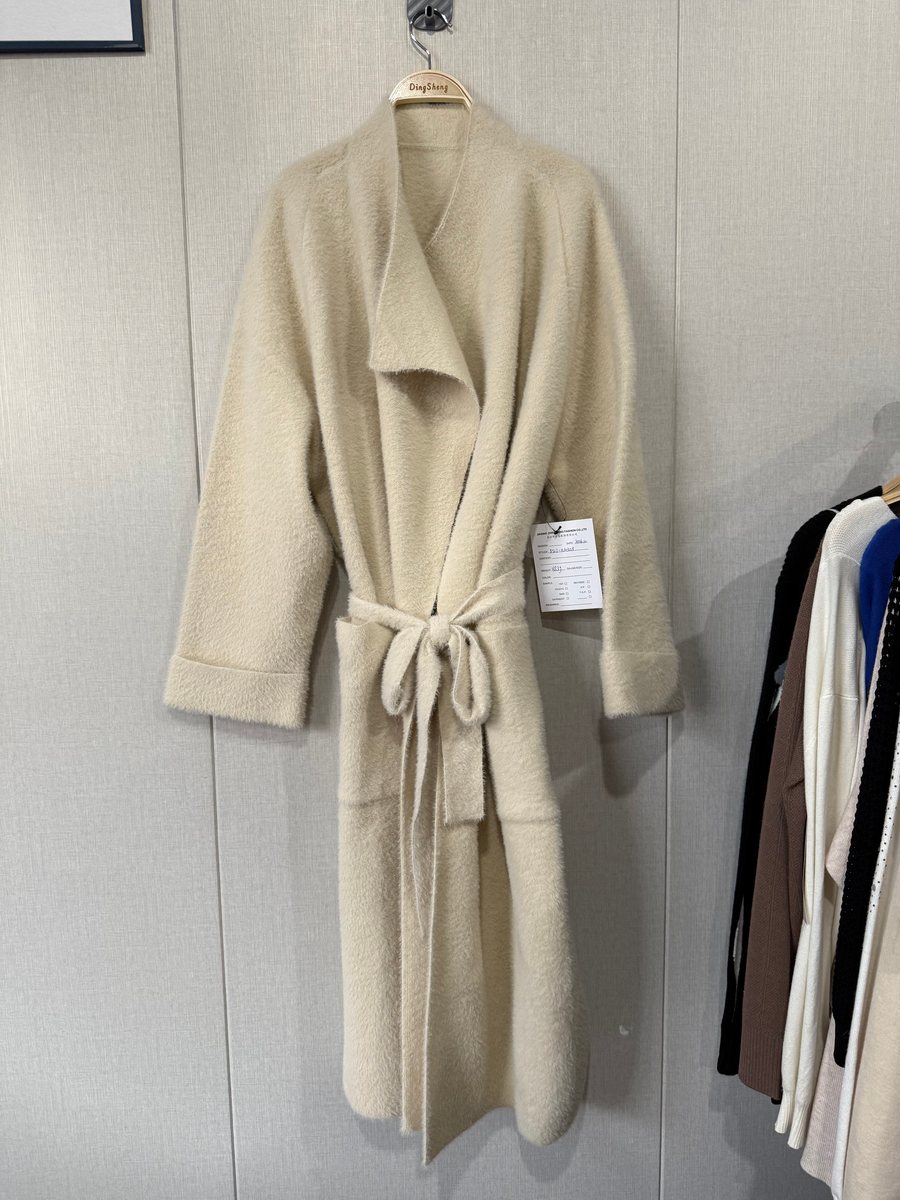 Ivory faux-mink belted long cardigan, style DS27-K10308, from the Knitwear World sample collection