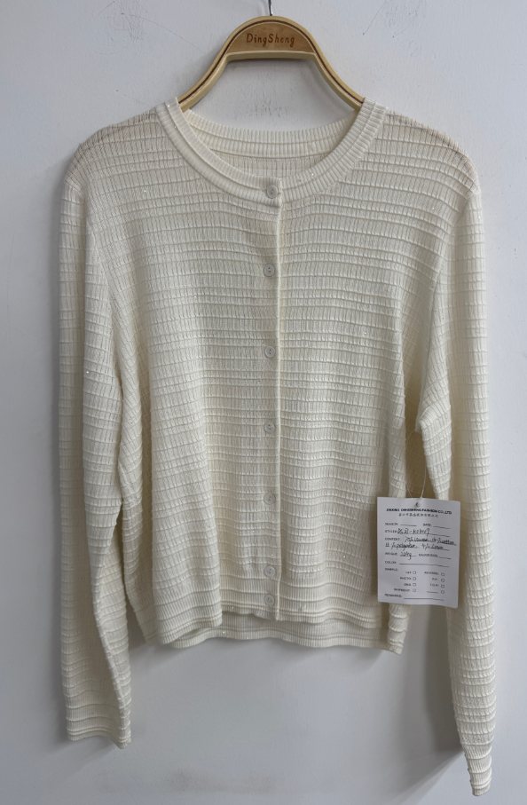 Ivory fine-knit cardigan, style DS27-K04009, from the Knitwear World sample collection