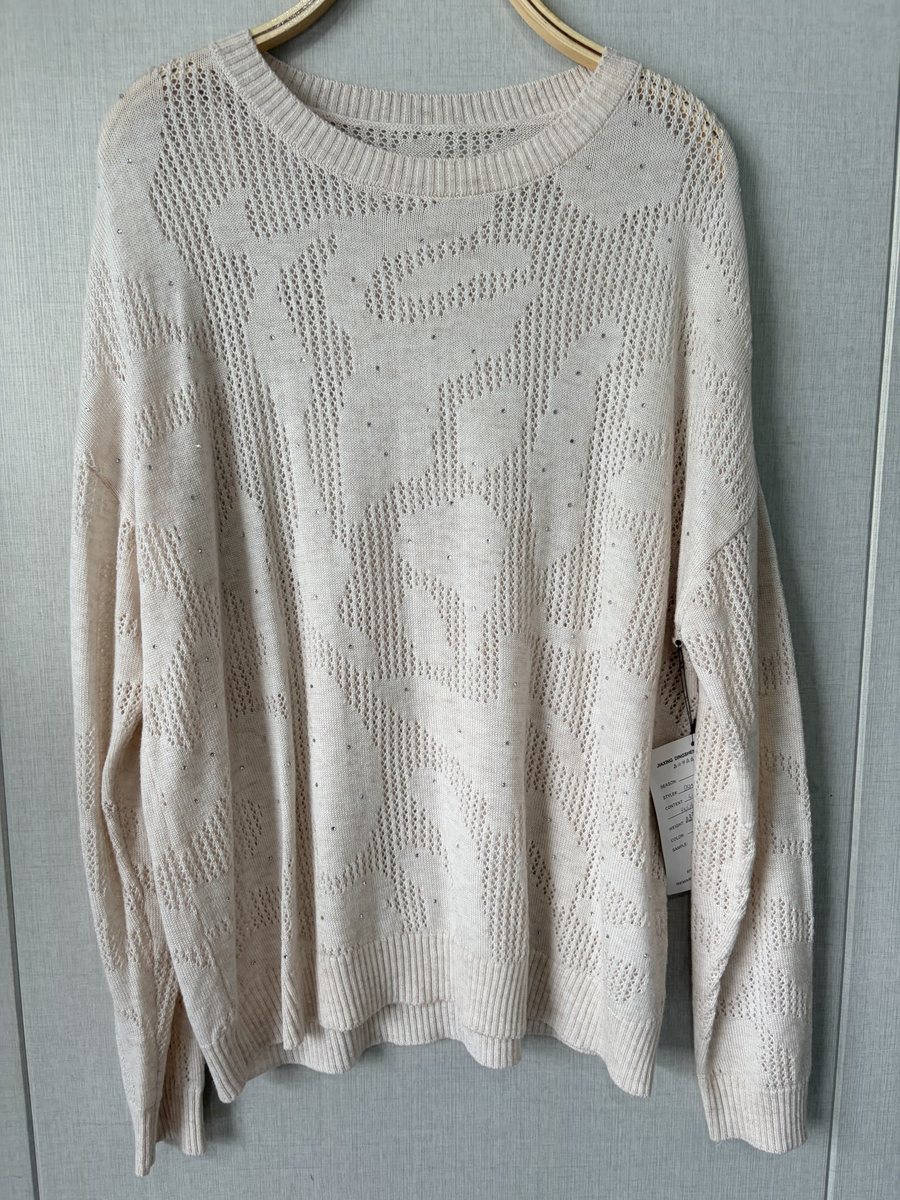 Ivory floral pointelle pullover, style DS25-03157-B, from the Knitwear World sample collection