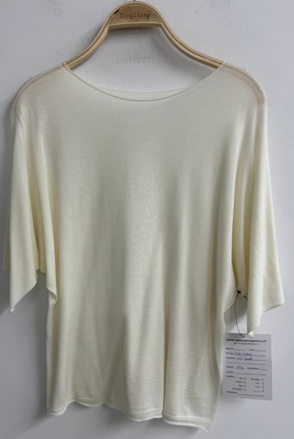 Ivory lyocell batwing top, style DS27-K06020, from the Knitwear World sample collection