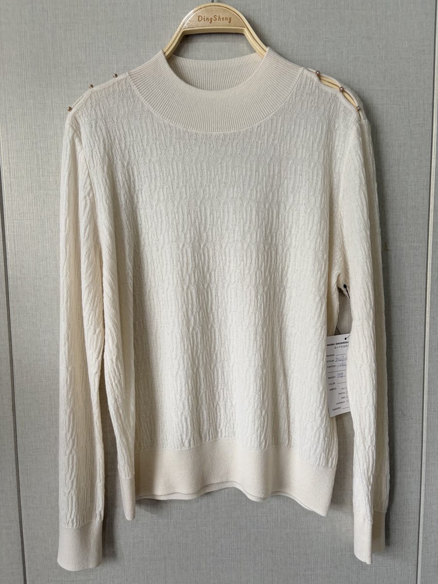 Ivory mock-neck wool pullover with button shoulder, style DS27-K07039, from the Knitwear World sample collection