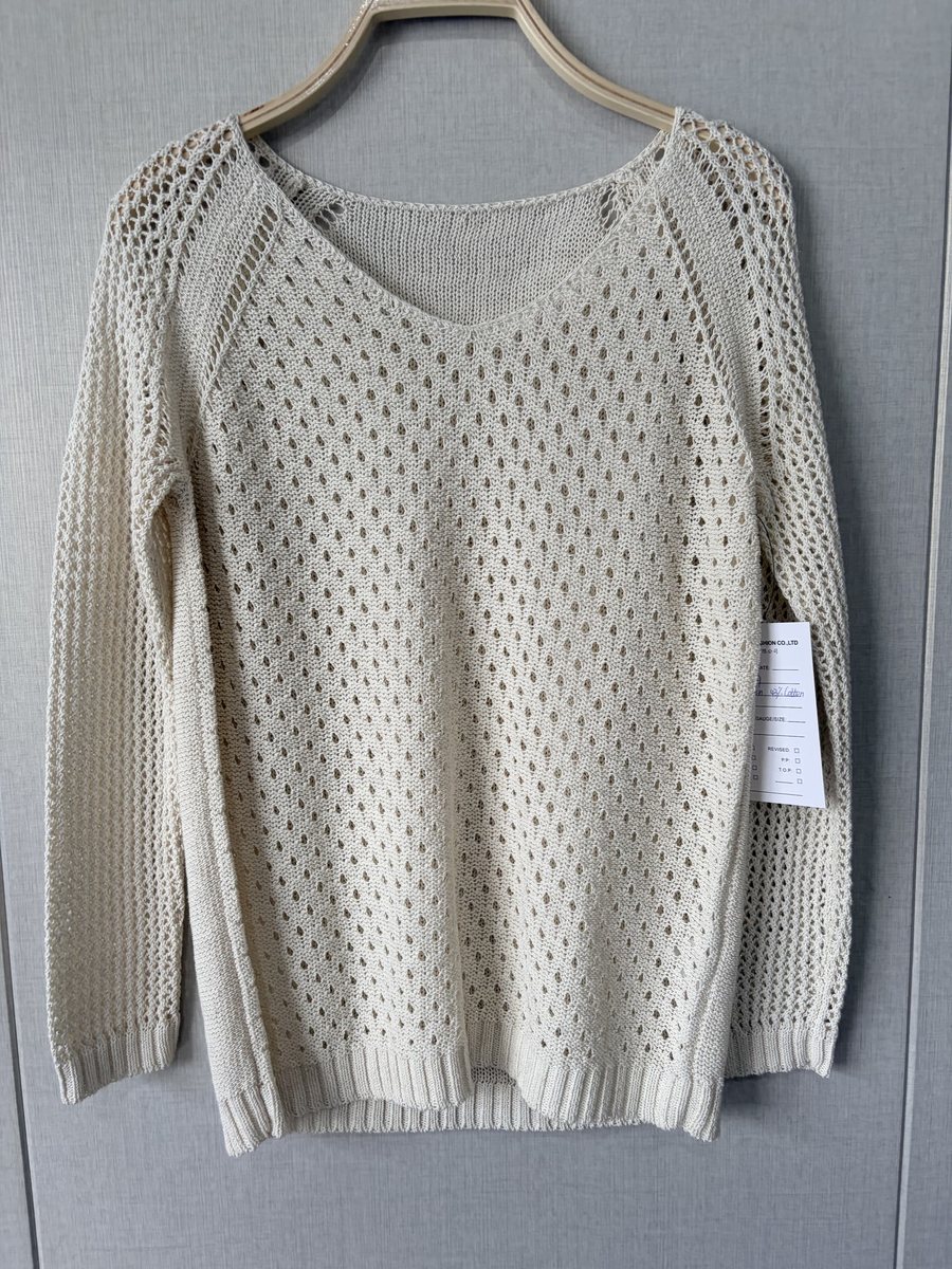 Ivory open-knit linen-blend pullover, style DS27-K06027, from the Knitwear World sample collection