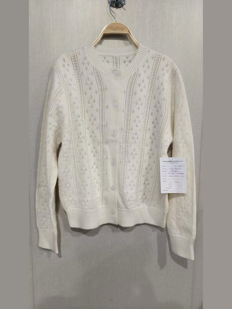 Ivory pointelle cardigan, style DS27-09037-A, from the Knitwear World sample collection