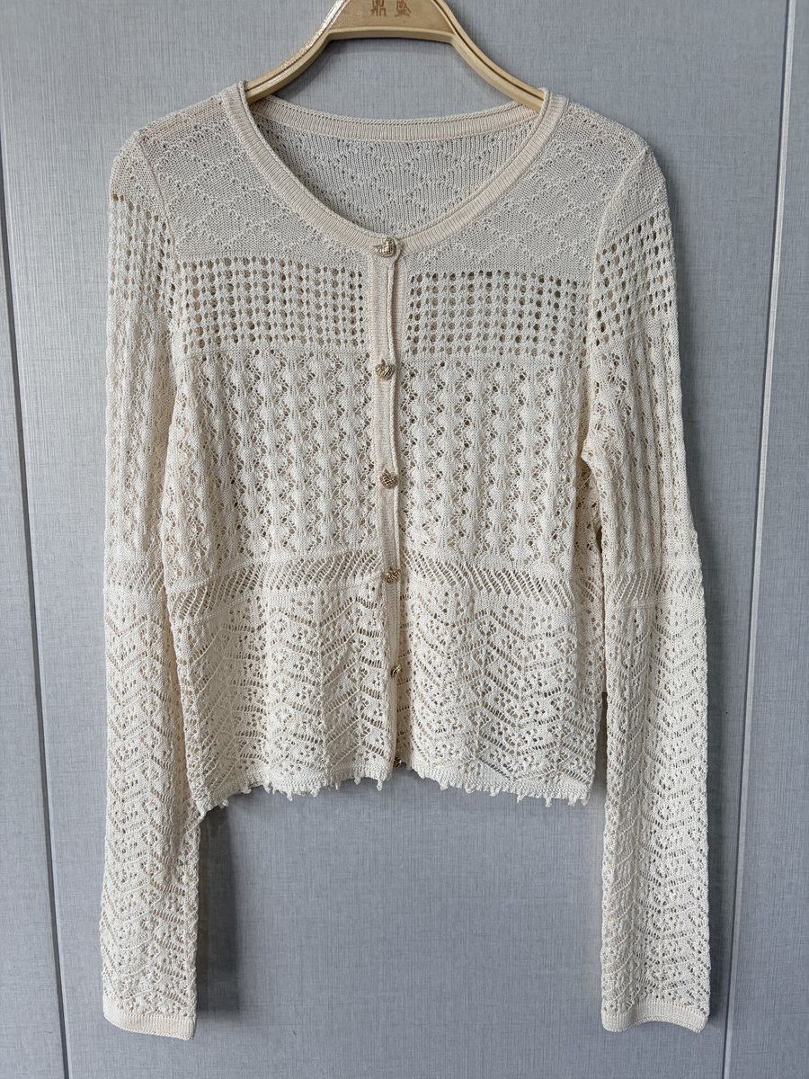 Ivory pointelle cotton cardigan with lace trim, style DS27-YS04023, from the Knitwear World sample collection