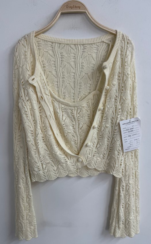 Ivory pointelle cotton cardigan with scallop hem, style DS27-K04041, from the Knitwear World sample collection