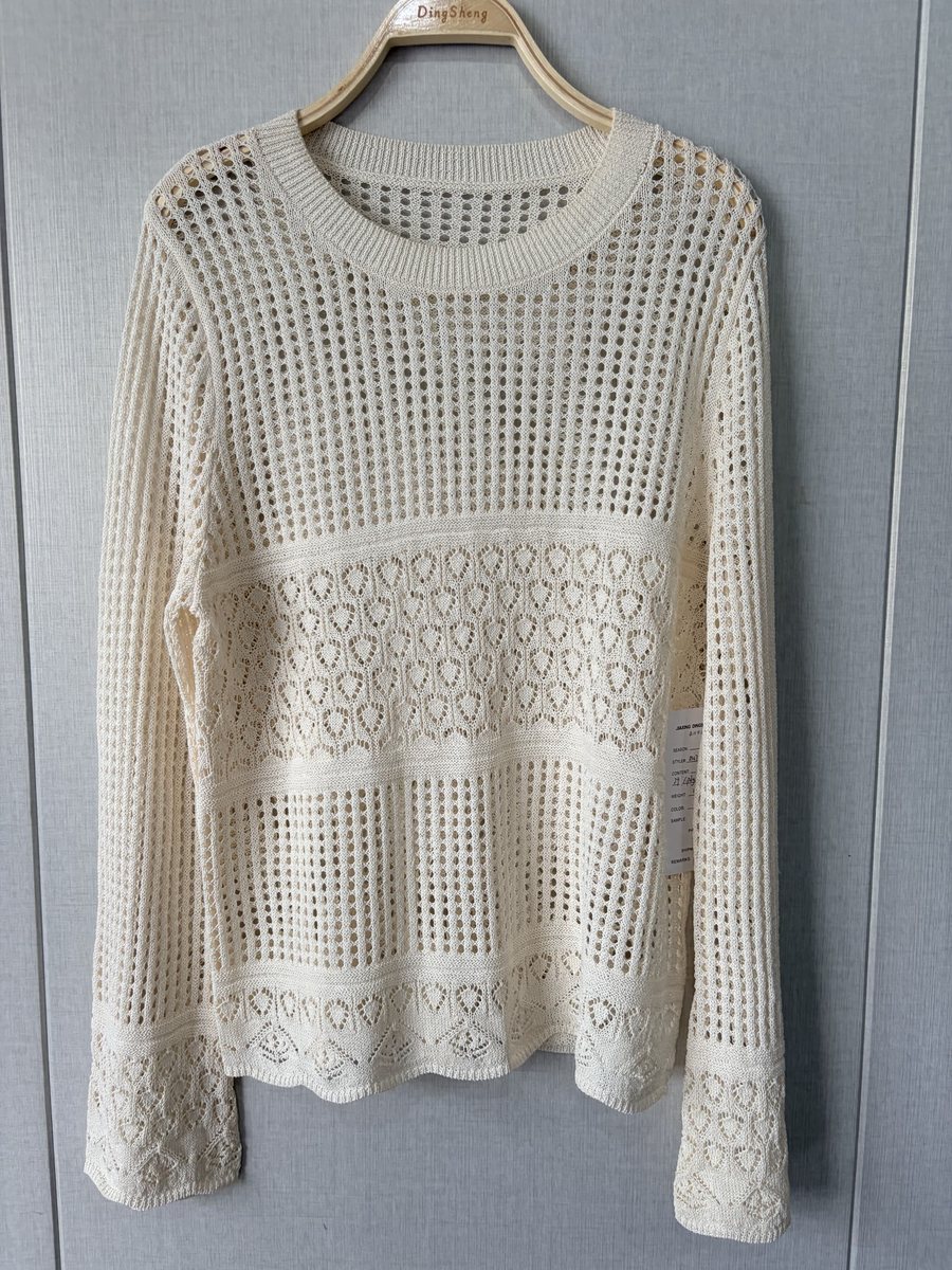Ivory pointelle pullover, style DS27-YS727, from the Knitwear World sample collection