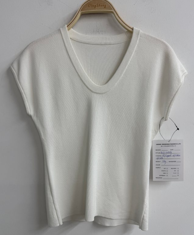 Ivory scoop-neck knit top, style DS27-K06034, from the Knitwear World sample collection