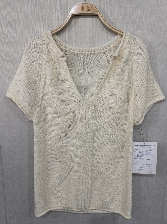 Ivory short-sleeve V-neck top with fringed-tape embroidery, style DS27-K070036, from the Knitwear World sample collection