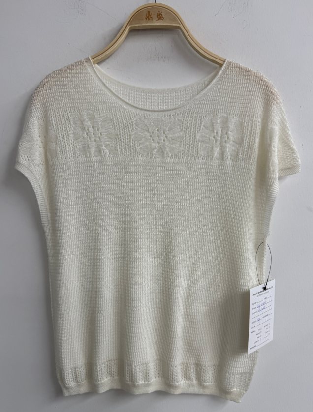 Ivory top with pointelle yoke, style DS27-K06017, from the Knitwear World sample collection