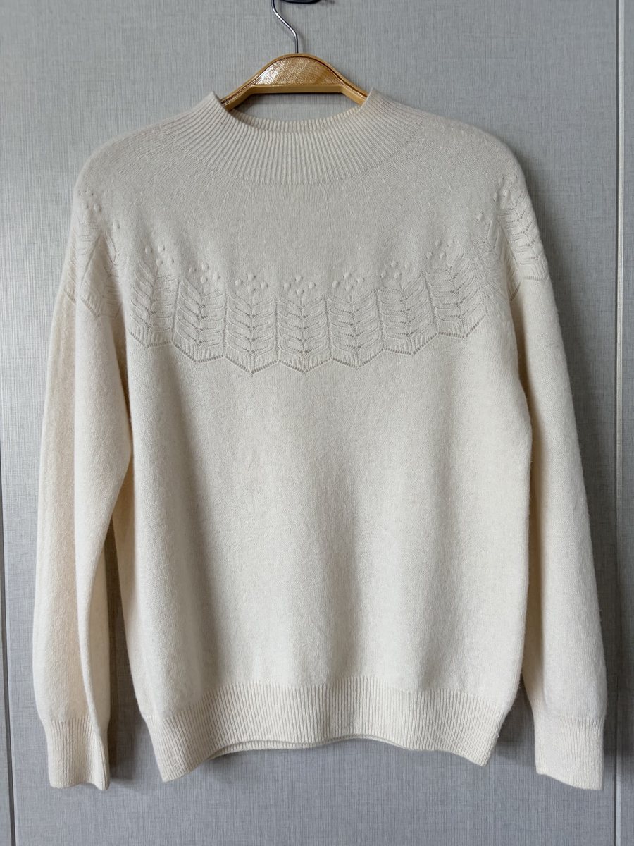 Ivory wool pullover with pointelle yoke, style DS27-K01002, from the Knitwear World sample collection